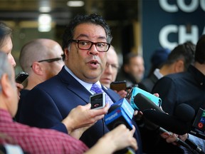 Calgary Mayor Naheed Nenshi during a media scrum after council votes to continue the Olympic bid process on Monday, April 16, 2018 in Calgary.. Al Charest/Postmedia