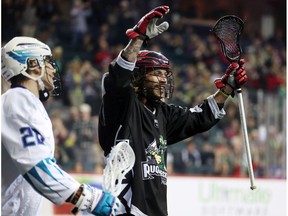 The Calgary Roughnecks' Tyson Bell celebrates his team's goal on the Rochester Knighthawks during NLL action at the Scotiabank Saddledome in Calgary on Saturday March 17, 2018.  Gavin Young/Postmedia