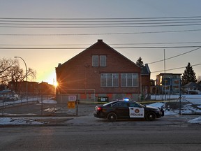 Police guard the scene of a late night officer involved shooting in Bridgeland on Tuesday morning April 10, 2018. One suspect was declared dead at the scene after a confrontation with two plainclothes officers at about 11:30 PM Monday night.