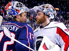 Sergei Bobrovsky of the Columbus Blue Jackets congratulates Braden Holtby of the Washington Capitals Monday, April 23, 2018 at Nationwide Arena in Columbus, Ohio. (Kirk Irwin/Getty Images)