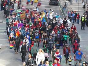 A section of costumed participants make their way down Stephen Ave Mall to Olympic Plaza during the Parade of Wonders in downtown Calgary to kick off the Calgary Comic & Entertainment Expo Friday, April 27, 2018. Jim Wells/Postmedia