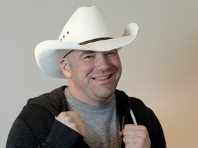 UFC president Dana White mugs for a photo at the Calgary Sun office Calgary on Wednesday, March 21, 2012. Ultimate Fighting Championship announced it would hold UFC 149 in Calgary on July 21, along with numbered events in Toronto (Sept. 22) and Montreal (Nov. 17). LYLE ASPINALL/CALGARY SUN/QMI AGENCY