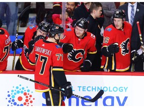 Calgary Flames rookie Mark Jankowski celebrates with teammates after scoring against the Vegas Golden Knights in NHL hockey at the Scotiabank Saddledome in Calgary on Saturday, April 7, 2018. Al Charest/Postmedia