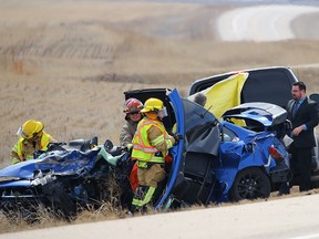 The scene of a deadly crash near Beiseker northeast of Calgary that killed three people and sent a child to hospital, it happen just after 10 a.m. on Friday, first responders were called to Highway 9 and Range Road 271 near Beiseker, about 75 kilometres northeast of Calgary. Police say two vehicles were involved in the crash. Al Charest/Postmedia