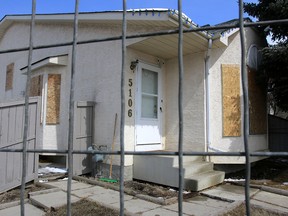 Fencing surrounds a drug house shut down by Alberta Sheriffs at 5106 Erin Pl. S.E. in Calgary Tuesday, April 17, 2018.