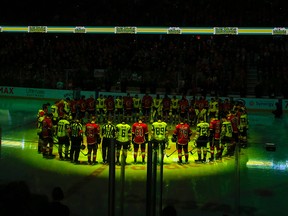 Calgary Flames and the Vegas Golden Knights pay tribute to the Humboldt Broncos before their game at the Scotiabank Saddledome on Saturday, April 7, 2018.
