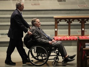 Former Presidents George W. Bush, left, and George H.W. Bush arrive at St. Martin's Episcopal Church for a funeral service for former first lady Barbara Bush, Saturday, April 21, 2018, in Houston. (David J. Phillip/AP Photo)