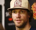 Calgary Flames Mike Smith during green garbage bag day at the Scotiabank Saddledome in Calgary, Alta., on Monday, April 9, 2018. Darren Makowichuk/Postmedia