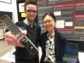Students from the U of C's Schulich School of Engineering show off their final projects at a design show on Tuesday, April 3, 2018. Steven Hepburn (L) and Rachel Chan (R) created a hand-held DNA sequencer called the MinION. Supplied photo.