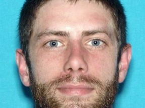 This undated identification photo released by the Maine State Police shows John Williams of Madison, Maine, who is being sought in connection with the shooting of a Somerset County sheriff's deputy very early Wednesday morning, April 25, 2018, in Norridgewock, Maine. Deputy Eugene Cole was killed while responding to a reported robbery. Police said Cole had been a deputy for 13 years and has a son. (Maine State Police via AP)
