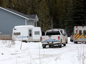 RCMP investigate a home on the Wesley First Nation where an infant died and 12 children were taking to hospital in Calgary on Wednesday, April 4, 2018.