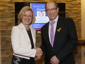 Premier Rachel Notley is greeted by Dr. Robert Barsky, B'nai Brith Calgary President as she was honoured by the B'nai Brith Calgary and the Calgary Menorah Foundation during their 67th Annual Charity Dinner at the Beth Tzedec Synagogue in Calgary on Thursday April 19, 2018. Darren Makowichuk/Postmedia