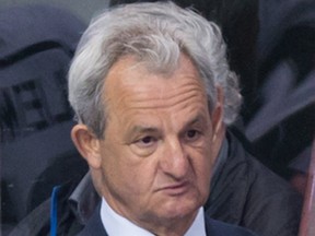 Los Angeles Kings' coach Darryl Sutter stands on the bench during third period NHL hockey action against the Vancouver Canucks, in Vancouver, B.C., on Friday March 31, 2017. THE CANADIAN PRESS/Darryl Dyck ORG