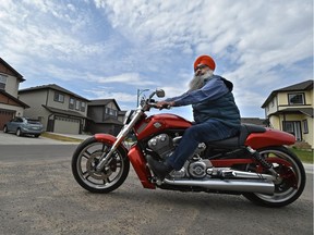 Bhupinder Singh might be the very first Sikh in Alberta to receive a new licence that allows him to ride a motorcycle without a helmet, in Edmonton, May 9, 2018.