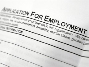 FILE - This April 22, 2014, file photo shows an employment application form on a table at a job fair in Hudson, N.Y. Middle-age white Americans with limited education are increasingly dying younger, on average, than other middle-age U.S. adults, a trend driven by their dwindling economic opportunities, research by two Princeton University economists has found. The economists, Anne Case and Angus Deaton, argue in a paper released Thursday, March 23, 2017, that the loss of steady middle-income job