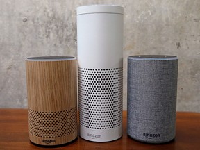 In this Sept. 27, 2017, file photo, Amazon Echo Plus, centre, and other Echo devices sit on display during an event announcing several new Amazon products by the company in Seattle.