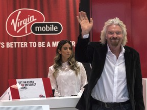 Richard Branson, president of Virgin Mobile, makes an appearance at Chinook Centre in Calgary on Tuesday, May 15, 2018.