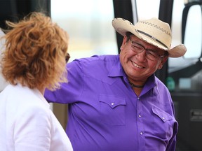 Tsuut'ina Chief Lee Crowchild greets guests before a bus tour of new development on the reserve southwest of Calgary on Thursday May 3, 2018. The evening also included a dinner with elders and young native artists at each table to facilitate a discussion of the history and culture of the Nation. 
Gavin Young/Postmedia