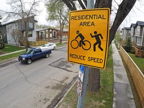 A residential reduce speed zone sign on 12th avenue N.E. in Calgary was photographed on Thursday May 10, 2018. City Council is looking at the possibility of reducing speed limits in residential areas from the current 50 km/h. Gavin Young/Postmedia
