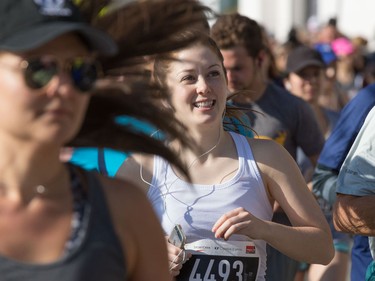 Marianna Chapman smiles as she head off the start with about 6000 runners, walkers and riders in the annual Sport Chek Mother's Day Run Walk and Ride at Chinook Centre on Sunday May 13, 2018. The event is a fundraiser for the neonatal intensive care units in Calgary.