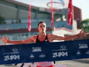 Calgary's Trevor Hofbauer won the Centaur Subaru Half Marathon event at the Scotiabank Calgary Marathon at Stampede Park on Sunday May 27, 2018.