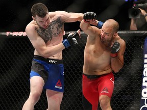 Chad Laprise punches Brian Camozzi during their UFC 213 welterweight bout at T-Mobile Arena on July 9, 2017 in Las Vegas. (Rey Del Rio/Getty Images)