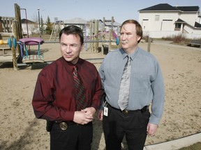 Former Det. Cliff O'Brien, left, and Det. Craig Cuthbert in Citadel on April 27, 2006, where Terrie Ann Dauphanis died. Her estranged husband has been charged in the slaying.