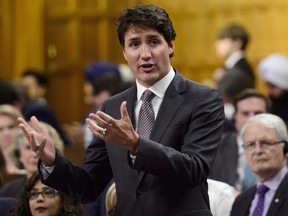 Prime Minister Justin Trudeau stands during question period in the House of Commons on Parliament Hill in Ottawa on Tuesday, May 22, 2018. (THE CANADIAN PRESS/Sean Kilpatrick )