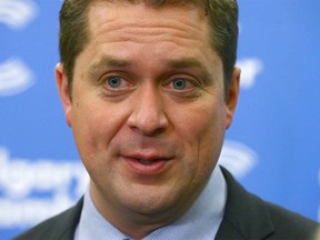 Andrew Scheer, Leader of Canadaís Conservative Party, answers media questions after participating in a noon hour question and answer session in Calgary on Friday, May 4, 2018. The event was hosted by the Calgary Chamber of Commerce and was held at the Westin Hotel. Jim Wells/Postmedia