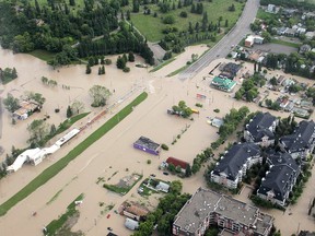 Erlton and the CTrain line are submerged as the Elbow River overflows during the 2013 flood in Calgary.