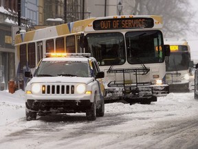A bus gets stuck during a snowstorm in Halifax on March 15, 2015.