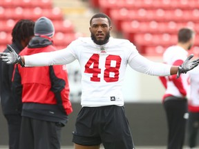 Calgary Stampeders Wynton McManis begs to have his photo taken and plays for the camera during practice at McMahon Stadium in Calgary on Wednesday, May 30, 2018