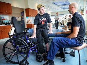 Humboldt Broncos hockey player Ryan Straschnitzki during his physiotherapy with physical therapist Kyle McIntosh at Foothills Medical Centre in Calgary, on Tuesday May 29, 2018.  Leah Hennel/Postmedia