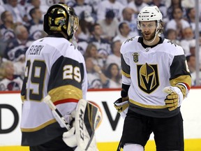 Vegas Golden Knights defenceman Colin Miller celebrates with goaltender Marc-Andre Fleury during Game 2 of the Western Conference final in Winnipeg on Mon., May 14, 2018. (Kevin King/Winnipeg Sun)