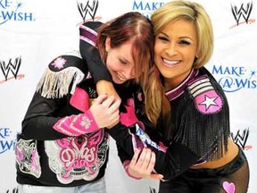 Nattie (above and below with her first "make a wish" Alexis. I gave her a jacket I wore at WrestleMania so she would never forget the time we had together.