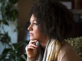 In this March 2, 2015, file photo, Rachel Dolezal, president of the Spokane chapter of the NAACP, poses for a photo in her Spokane, Wash., home. (Colin Mulvany/The Spokesman-Review via AP, File)