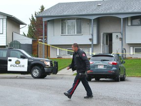 Calgary police attend a crime scene on Penbrooke Cl SE in Calgary on Thursday, May 17, 2018. A witness was told by police that shots were fired by police.