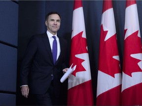 Finance Minister Bill Morneau arrives to the National Press Theatre to hold a press conference in Ottawa on Tuesday, May 29, 2018. Finance Minister Bill Morneau says Canada is going to buy the Trans Mountain pipeline and all of Kinder Morgan Canada's core assets for $4.5 billion.