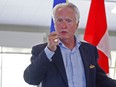 Senator Doug Black, shown here speaking to the Grande Prairie Rotary Club in 2014, introduced a bill in February clarifying federal jursdiction over Trans Mountain.