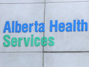 FILE PHOTO: CALGARY, AB: NOVEMBER 11, 2014 - An Alberta Health Services sign and logo was photographed on Tuesday November 11, 2014. STK.