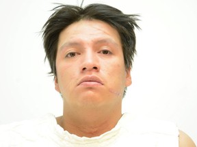 Police are looking for Kyle Bearhat, charged in a downtown Calgary slaying.