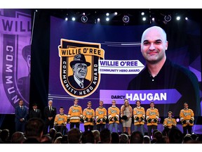 LAS VEGAS, NV - JUNE 20:  Christina Haugan accepts the Willie O'Ree Community Hero Award given to an individual who through the game of hockey has positively impacted his or her community, society or culture, given to her late husband Darcy Haugan who was the coach of the Humboldt Broncos onstage at the 2018 NHL Awards presented by Hulu at The Joint inside the Hard Rock Hotel & Casino on June 20, 2018 in Las Vegas, Nevada. Sixteen people were killed and 13 injured when truck was struck by a northbound coach bus. Most of the dead were junior hockey players who played for the Humboldt Broncos.