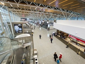 The new international terminal of the Calgary International Airport stands in Calgary, Alta., on Monday, Oct. 31, 2016. The $2 billion facility was in its opening day. Lyle Aspinall/Postmedia Network