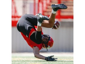 Calgary Stampeders Eric Rogers makes a catch during practice on Tuesday, June 12, 2018. Al Charest/Postmedia