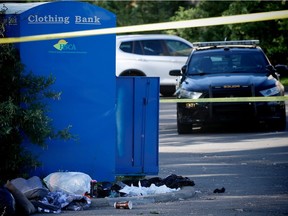 Police were called to the Hillhurst Sunnyside Community Centre on 5 Avenue N.W. after a  person was found in serious condition inside a blue donation bin on Monday, June 25, 2018. Al Charest/Postmedia