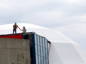 The old planetarium/ Science Centre in Calgary being worked on Monday June 18, 2018. Darren Makowichuk/Postmedia