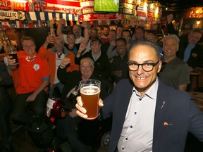 Joe Ceci, President of Treasury Board, Minister of Finance announced a provincewide liquor service extension is being offered to all establishments where liquor is served for on-site consumption throughout the duration of the FIFA World Cup, which is set to start June 14 and end July 15 at the The Ship & Anchor in Calgary on Tuesday June 12, 2018. Darren Makowichuk/Postmedia