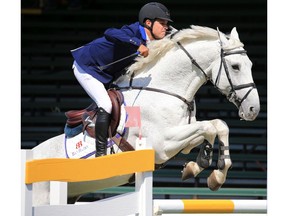 Brazil's Rodrigo Lambre riding Velini competes in the Bantrel Cup at the Spruce Meadows National on Wednesday June 6, 2018.  Gavin Young/Postmedia