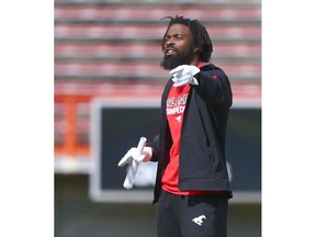 Former Stampeder player Josh Bell gives instructions at rookie camp with the Stampeders in Calgary on Friday, May 18, 2018. Jim Wells/Postmedia