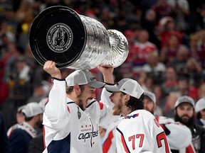 Jay Beagle, left, of the Washington Capitals celebrates winning the Stanley Cup after his team defeated the Vegas Golden Knights 4-3 on June 7, 2018.